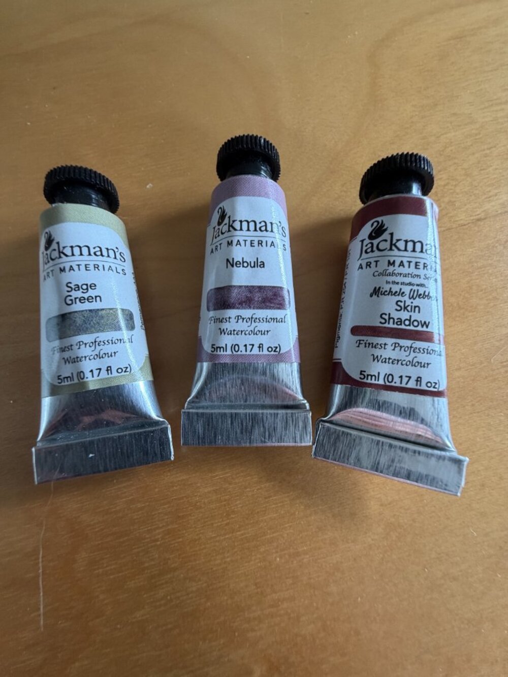 Three tubes of Jackman's paint